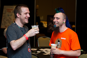 Two people enjoying lobbycon